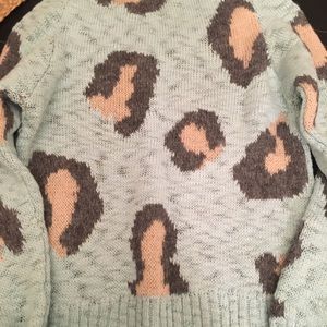 Sleeping on snow Leopard sweater by Anthropologie